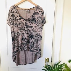 Mauve patterned high low T w ferns and creatures